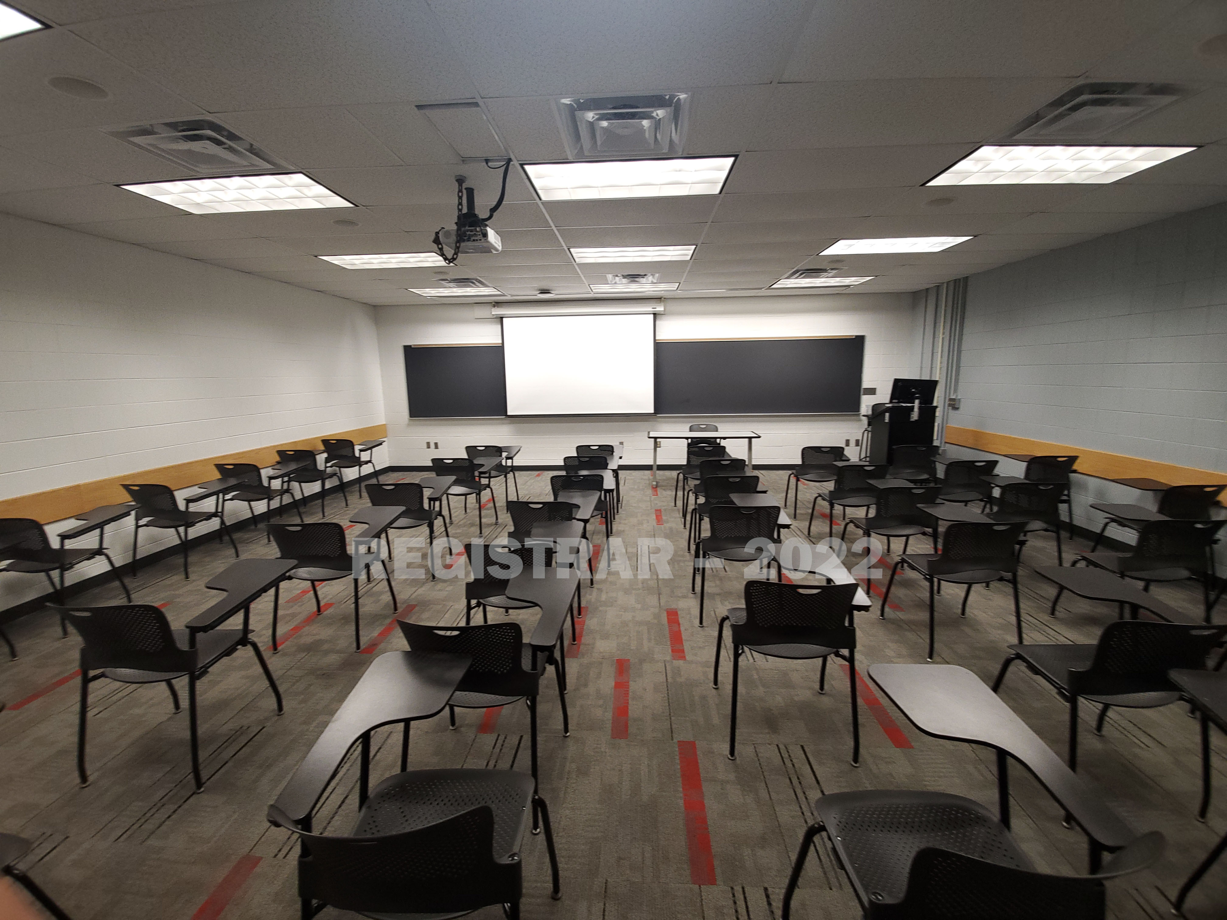 University Hall room 38 back of room projection screen down ultra wide angle view